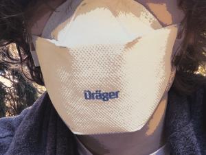 A posterized closeup of the Draeger X-plore 1950, an N95 mask with a boxy, white trifold design.